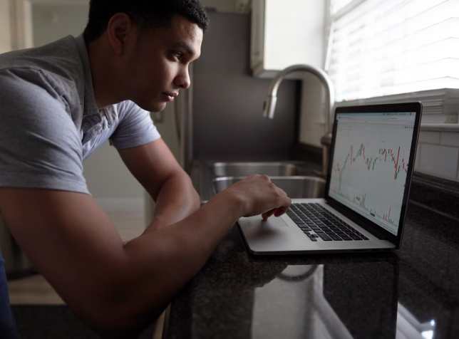  a man reading a report